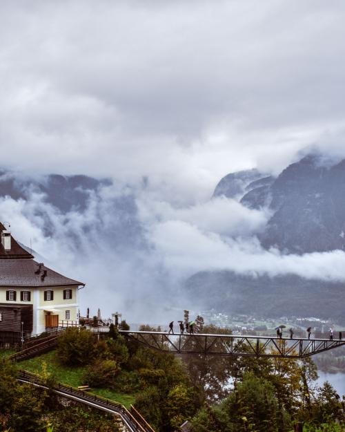 Beautiful mountain landscape with a bridge and clouds in Hallstatt, Austria.
