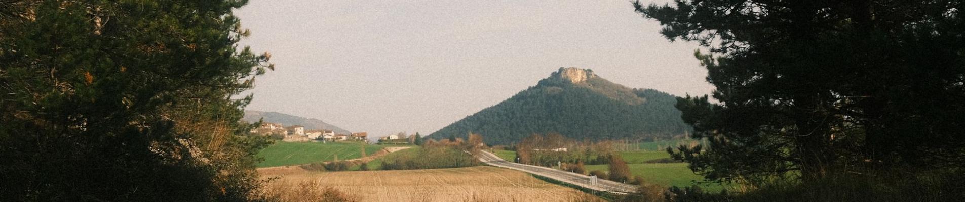 Peaceful rural landscape with mountain view near Pamplona, Spain.
