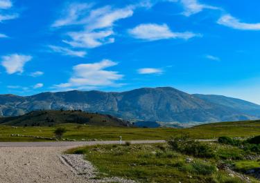Serene landscape featuring mountains and blue sky in Bosnia and Herzegovina.